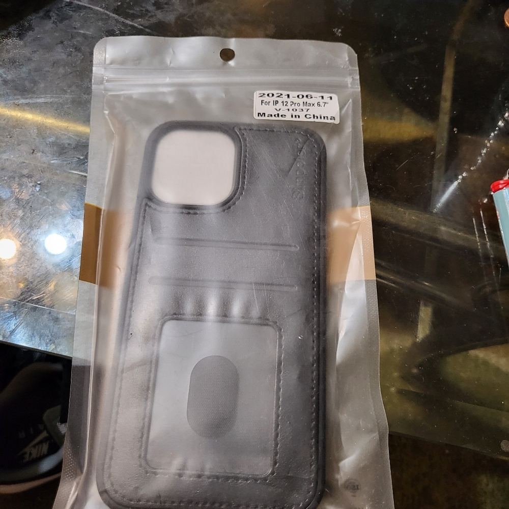 case for 12 Promax black with screen protector